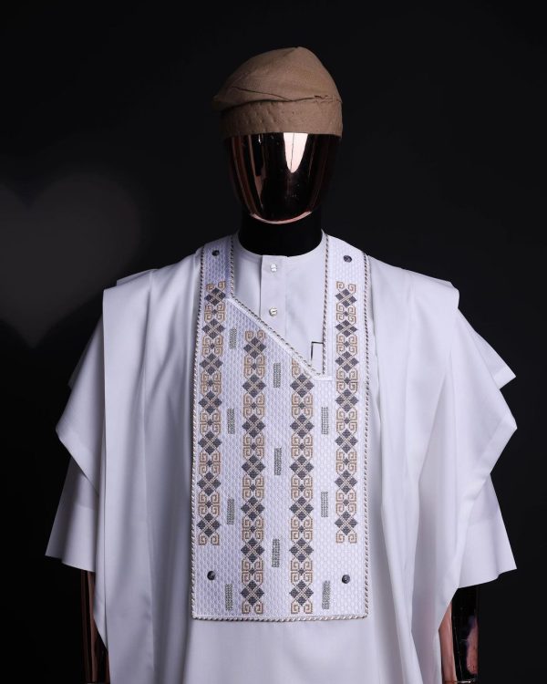 A white, shattered interwoven embroidery with Swarovski stones details agbada