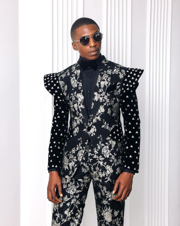 A “Vegas 2”, Floral pattern jacquard, Elevated shoulder and sleeve with Swarovski details peak Lapel tux suit