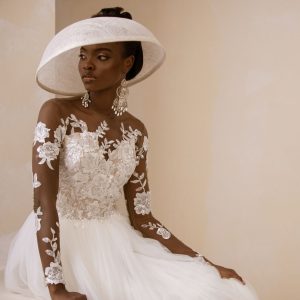 An Ivory Top Patterned Long Sleeve Tulle Wedding gown/dress