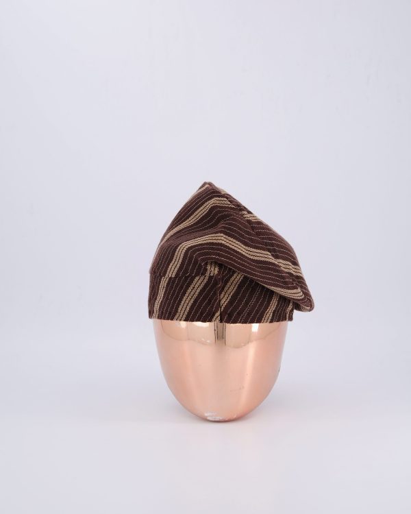 A Chocolate brown Yoruba traditional hat or fila